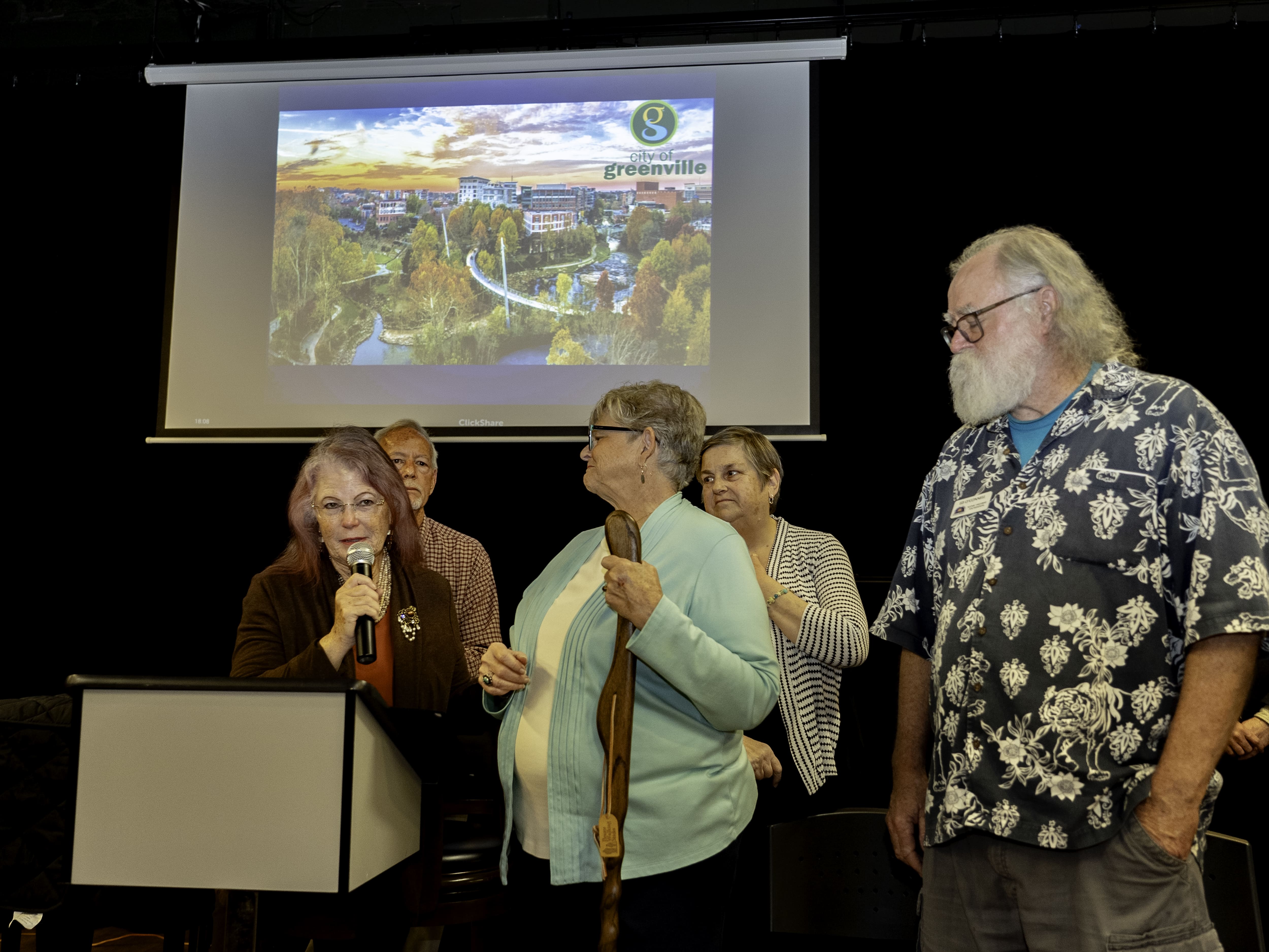 Gena Buchanan receiving the Bluffline Defender Award